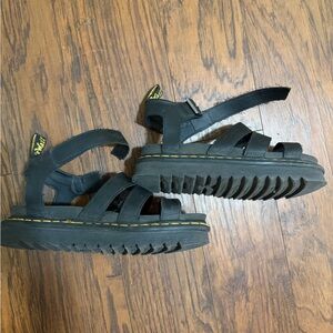 Women’s Dr.Martens platform sandals in black.